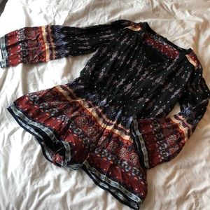 Beautiful long sleeve button front romper